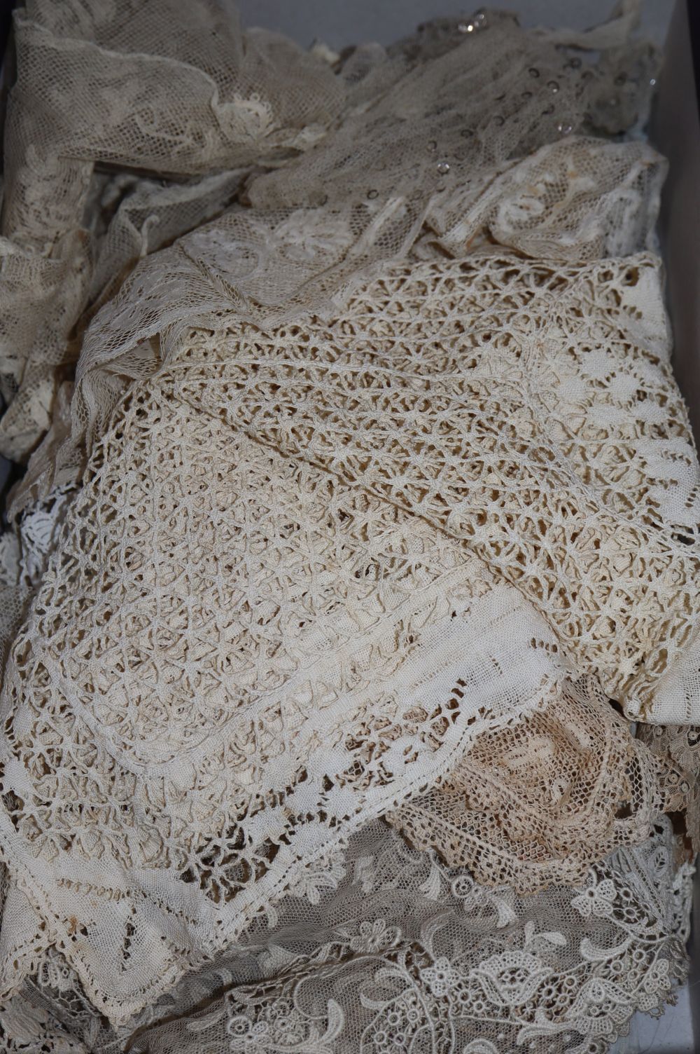 A collection of 19th century handmade needle lace, bobbin laces and Irish crochet